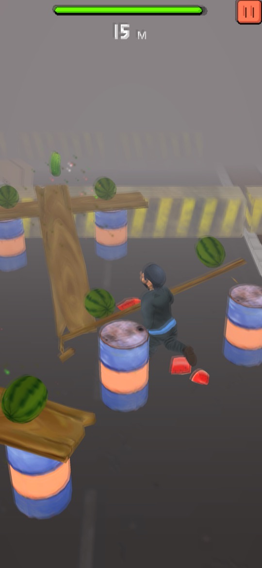 Running past barrels and planks stacked with watermelons